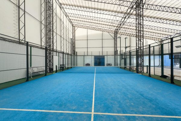 Padel court with lines and net indoor
