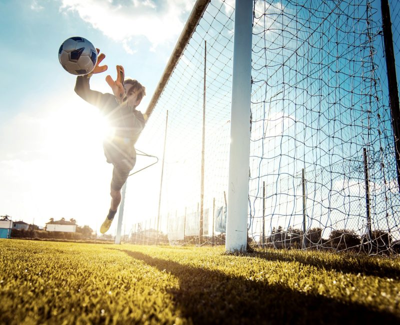 Soccer player in action on the soccer stadium